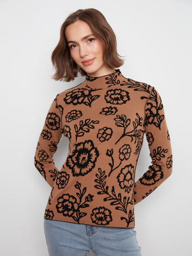 Enjoy the reversible design of this chic sweater, offering versatility and style by Charlie B.
