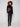 Long sleeve black sweater featuring an intricate leaf design for chic layering by Charlie B.