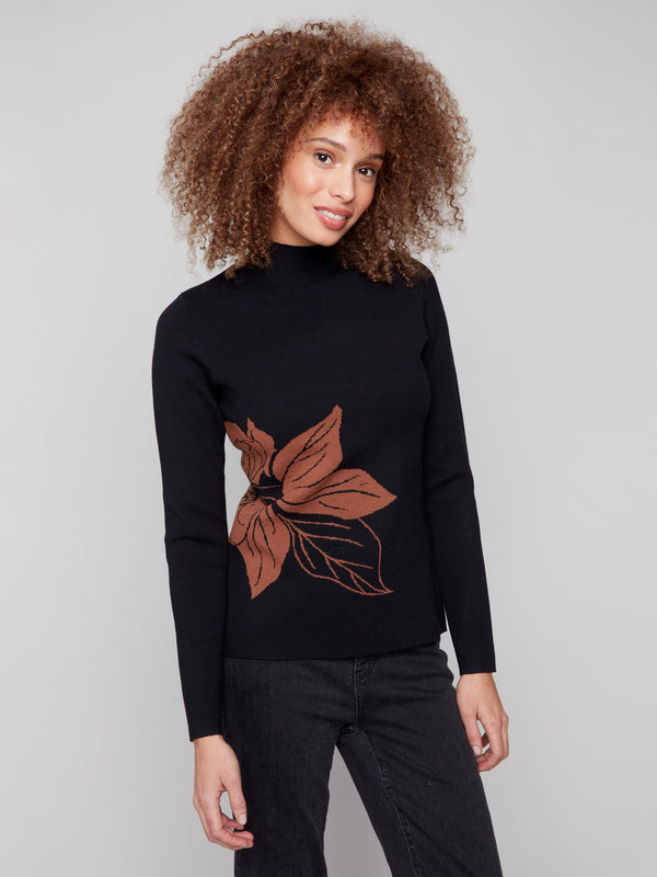 Elegant slim fit black sweater adorned with a sophisticated leaf pattern by Charlie B.