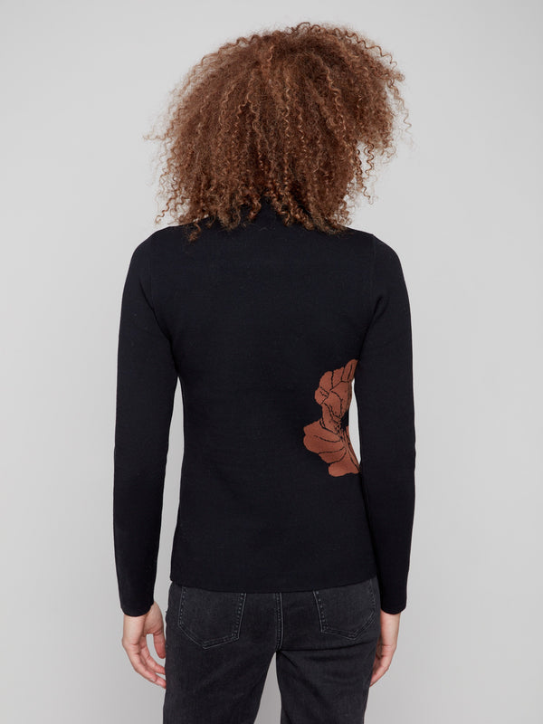 Brown reversible sweater with detailed leaf accents, adding flair to any outfit by Charlie B.