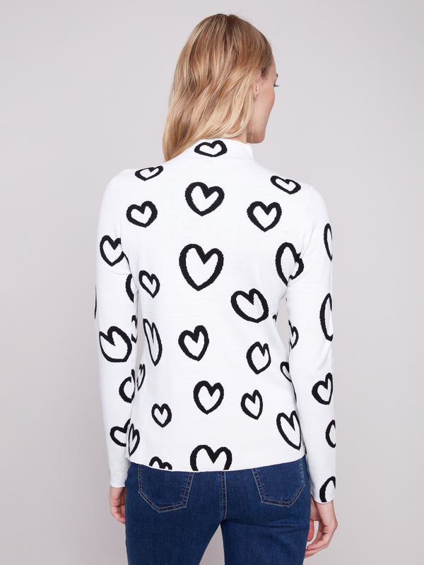 Eye-catching slim fit top with whimsical hearts, offering both style and comfort by Charlie B.