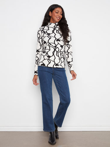 A perfect blend of style and function, this mock neck top is crafted to keep you warm yet fashionable by Charlie B.