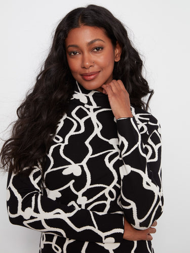 The long sleeves add a touch of sophistication, making it ideal for cooler days while maintaining style by Charlie B.