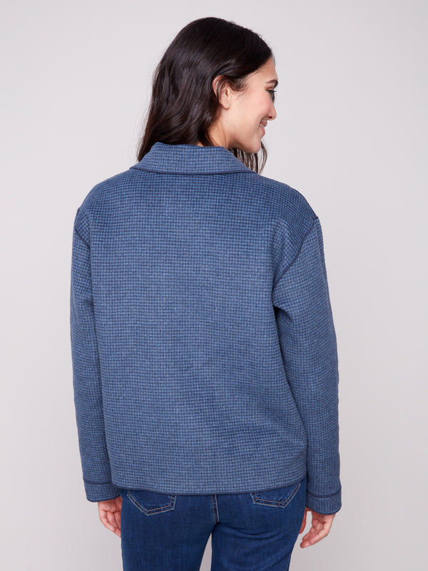 Discover dual styling options with the reversible design of this elegant moonlight plaid jacket by Charlie B.