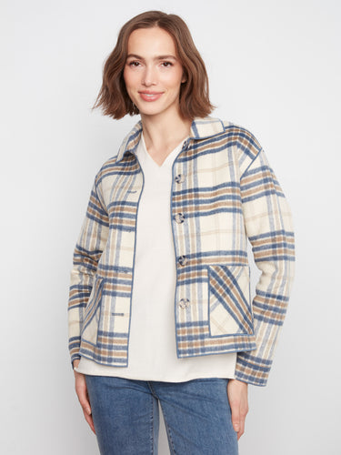 Classic plaid style meets modern functionality in this piece featuring patch pockets. By Charlie B.