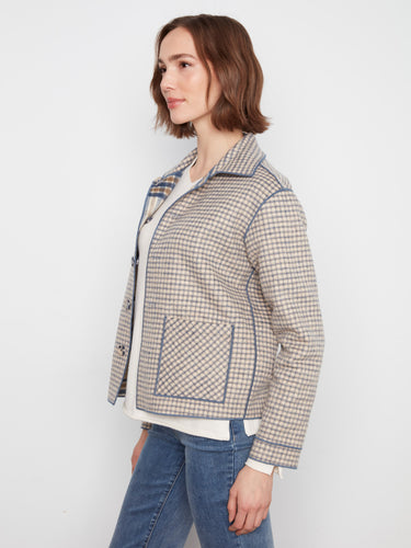Elegant checkered fabric complements the shirt collar for a sophisticated look. By Charlie B.