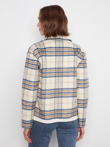 Stylish plaid pattern with button-front closure offers easy wearability and charm. By Charlie B.