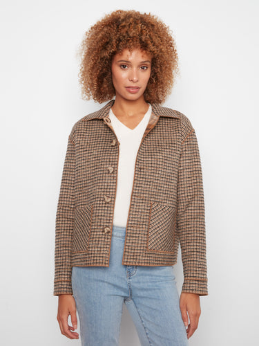 Reversible jacket showcasing a stylish check pattern with functional patch pockets. By Charlie B.