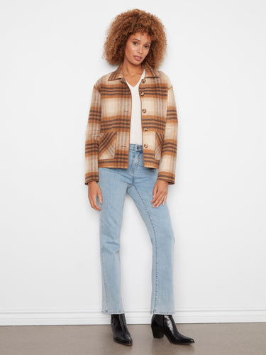Stylish plaid jacket featuring a versatile reversible design for multiple looks. By Charlie B.