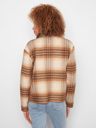 Brown plaid pattern on this reversible design offers two looks in one stylish piece. By Charlie B.