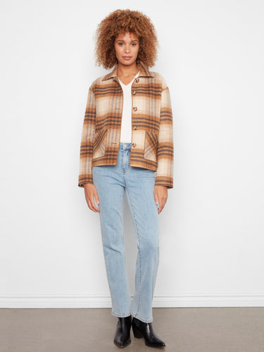 Classic shirt collar on this plaid piece enhances its sophisticated look effortlessly. By Charlie B.