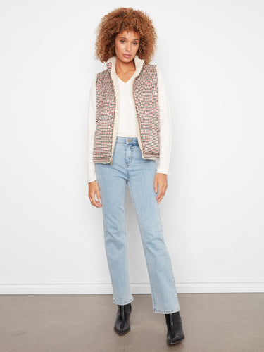 Stylish vest with a zip-front closure, ideal for effortless layering and versatile styling. By Charlie B.