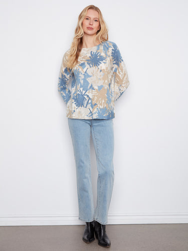 Stylish reversible sweater adorned with neutral abstract prints, complete with cozy long raglan sleeves by Charlie B.