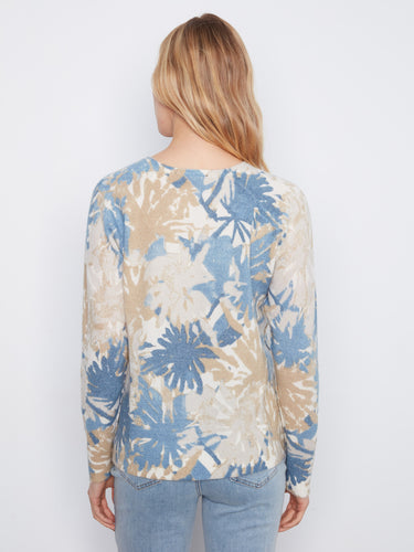 Versatile reversible sweater characterized by its unique abstract prints and classic crew neckline, enhanced with raglan sleeves by Charlie B.