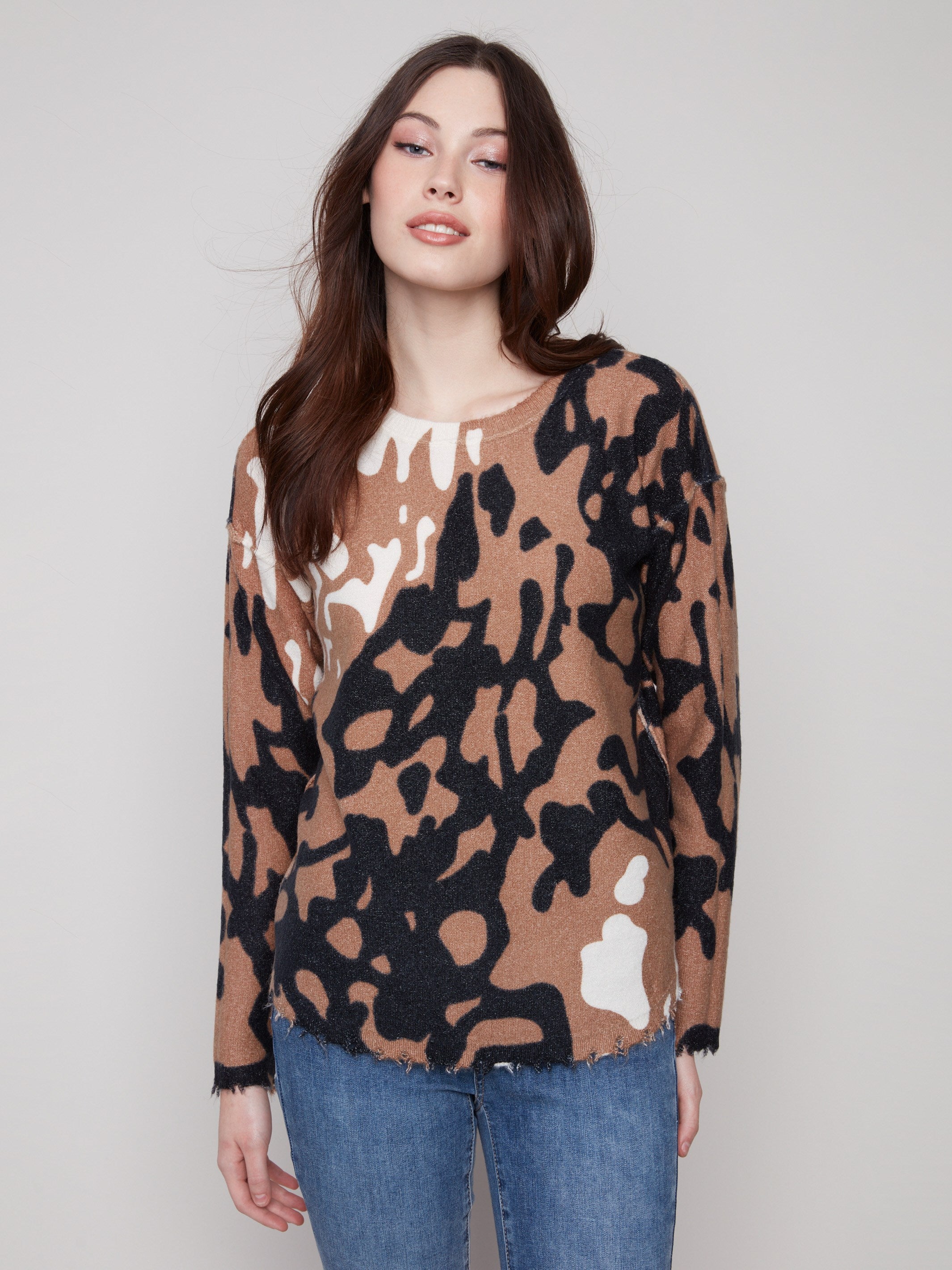 Brown and black spotted plush sweater featuring a crew neckline, perfect for cozy days by Charlie B.