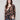 Brown and black spotted plush sweater featuring a crew neckline, perfect for cozy days by Charlie B.