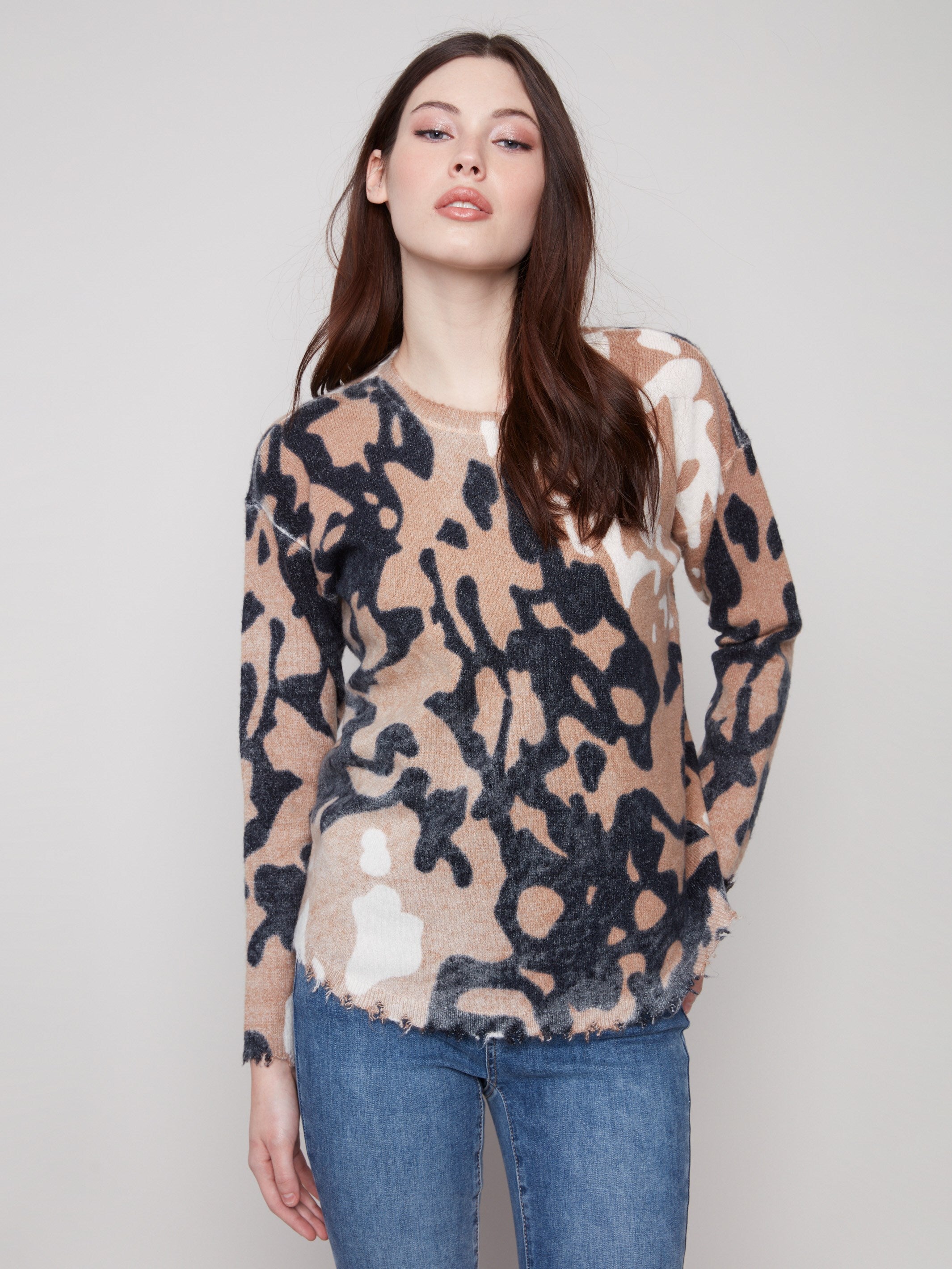 Stylish plush sweater with a reversible design, showcasing brown and black spots by Charlie B.