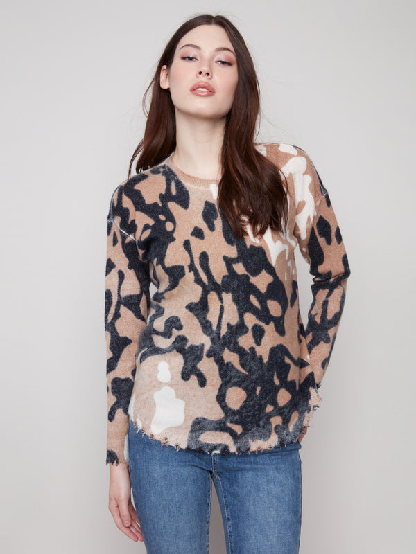 Stylish plush sweater with a reversible design, showcasing brown and black spots by Charlie B.