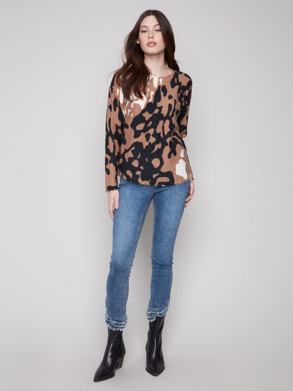 Plush texture in brown and black spots makes this sweater both stylish and comfortable by Charlie B.