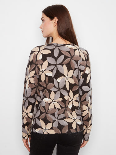 Geometric patterned sweater emphasizing its unique reversible design, perfect for versatile styling by Charlie B.