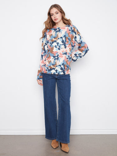 Stay cozy in style with these long sleeves on the floral sweater, ideal for cooler weather comfort. By Charlie B.