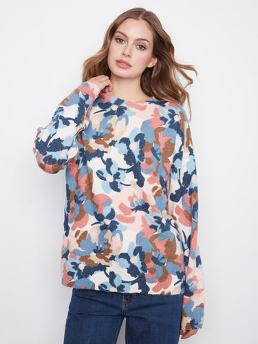 This reversible design allows you to enjoy two looks in one with the vibrant floral pattern. By Charlie B.