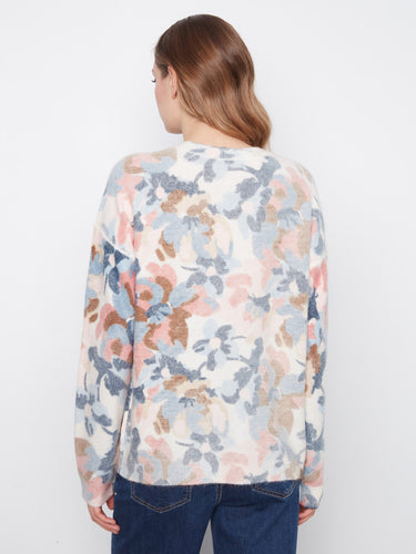 Featuring drop shoulders, this piece offers both comfort and contemporary fashion appeal. By Charlie B.