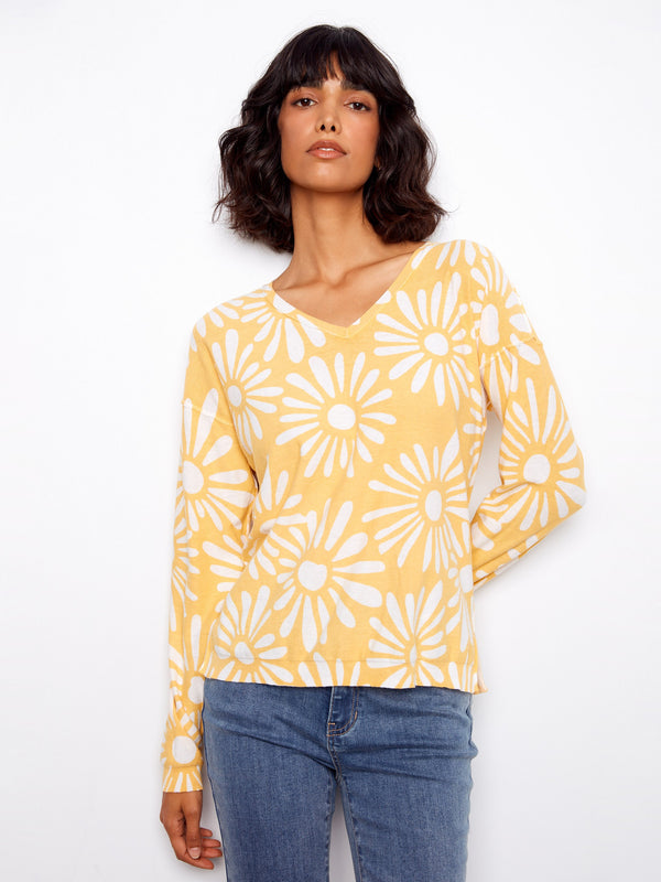 Stylish long-sleeved top featuring a reversible printed design that adds versatility to your wardrobe. Crafted from 100% cotton by Charlie B.