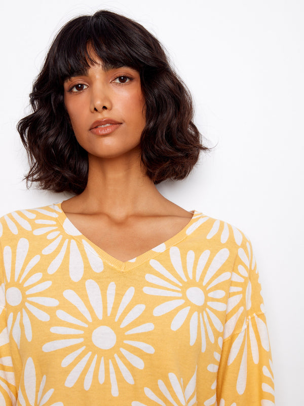 Embrace comfort and style with this 100% cotton sweater, offering long sleeves and a delightful printed design. A must-have by Charlie B.