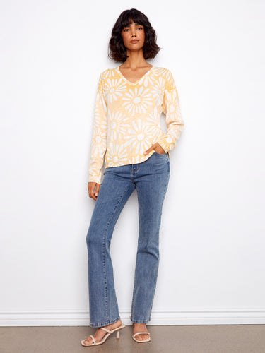 This reversible printed sweater combines fashion and function, crafted from soft cotton for all-day wearability. Designed by Charlie B.