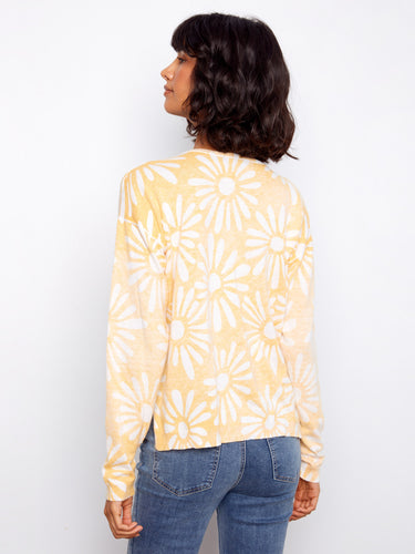 Experience the perfect blend of comfort and style with this charming floral print sweater made from premium cotton fabric by Charlie B.