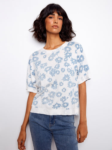 This stylish reversible floral top offers versatility in your wardrobe. Crafted from soft, breathable cotton by Charlie B.