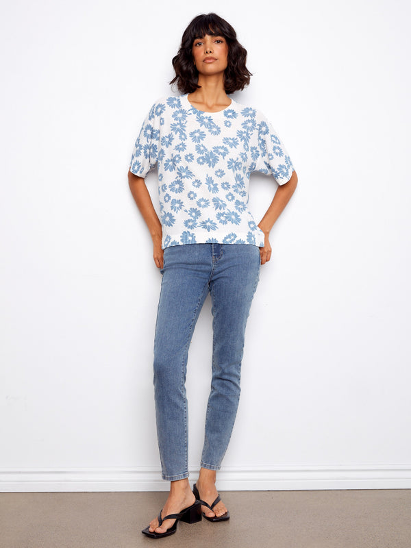 Chic floral print top crafted from 100% cotton, featuring a timeless crew neckline that adds elegance to any outfit by Charlie B.