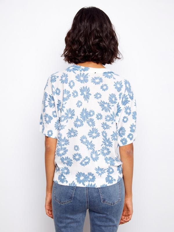 A must-have short-sleeve floral tee made of pure cotton ensures breathability and comfort throughout the seasons by Charlie B.