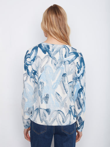 The vibrant pattern of this long-sleeve top adds an artistic touch to your wardrobe essentials. By Charlie B.