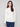 Ecru ribbed sweater showcasing a classic crew neck style, perfect for layering or wearing alone by Charlie B.