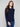 Navy sweater featuring a classic crew neck design, perfect for layering in any season. The ribbed knit adds texture and style by Charlie B.