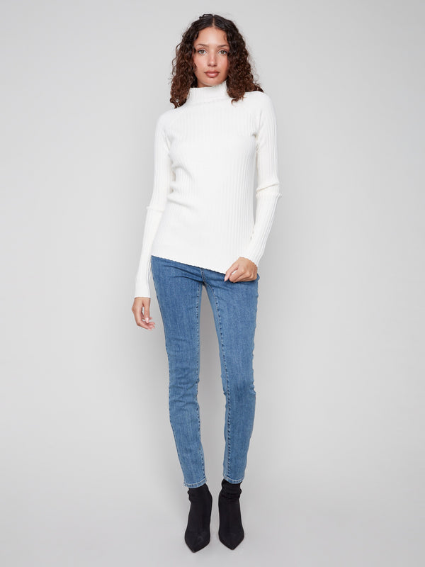 Ribbed knit texture enhances the ecru sweater's stylish appearance by Charlie B.