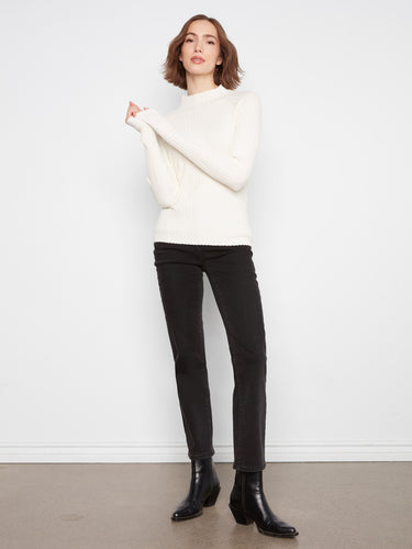 Ribbed knit texture adds depth to this versatile piece, offering comfort and elegance in one. A must-have addition by Charlie B.