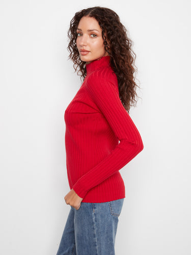 This slim fit sweater hugs the body beautifully, offering both comfort and style in a striking red hue. By Charlie B.