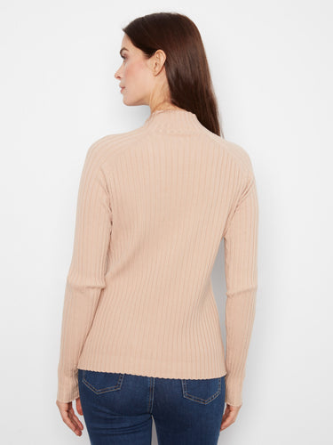 The slim fit of this elegant beige sweater provides both comfort and style for everyday wear. By Charlie B.