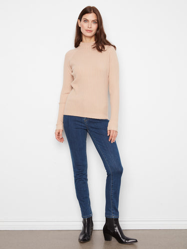 Long sleeves add to the allure of this versatile beige mock neck sweater, perfect for layering year-round. By Charlie B.