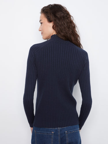 Comfortable long sleeve design in a classic navy hue, ideal for layering or wearing alone. By Charlie B.