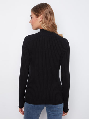 Sophisticated black knit sweater with long sleeves and a sleek silhouette by Charlie B.