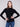Chic mock neck black sweater in soft ribbed knit, offering both comfort and elegance by Charlie B.