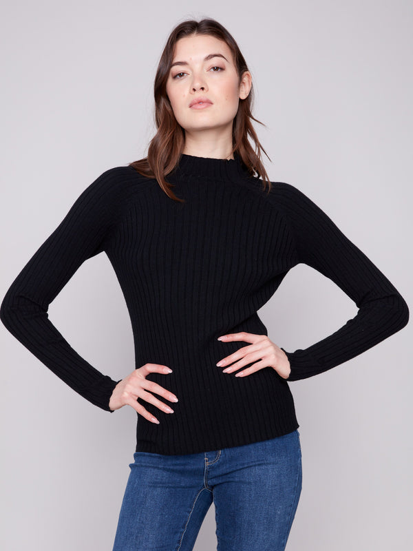 Chic mock neck black sweater in soft ribbed knit, offering both comfort and elegance by Charlie B.