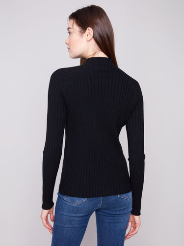 Sophisticated ribbed knit detailing enhances the classic look of this black sweater by Charlie B.