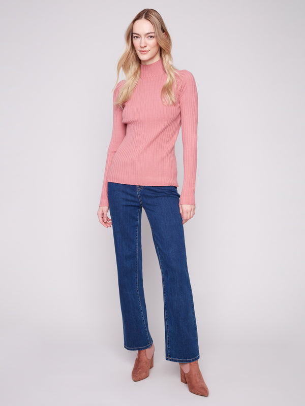 This slim fit primrose sweater offers a flattering silhouette for a modern look by Charlie B.