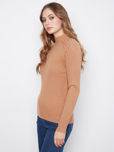 Mock neck detail enhances the elegance of this beautifully crafted sweater by Charlie B.