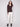 Elegant mocha sweater showcasing ribbed texture and slit cuffs for a modern touch by Charlie B.